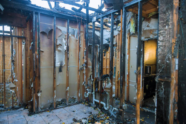 Professional Fire Damage Restoration technician working in De Kalb, TX